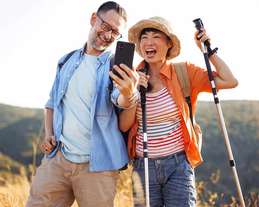 Happy couple hiking.