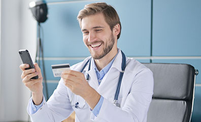 doctor with credit card