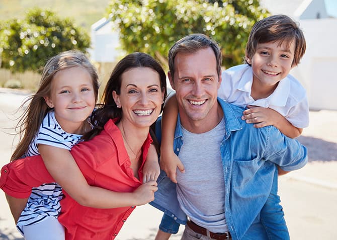 young family having fun outdoors