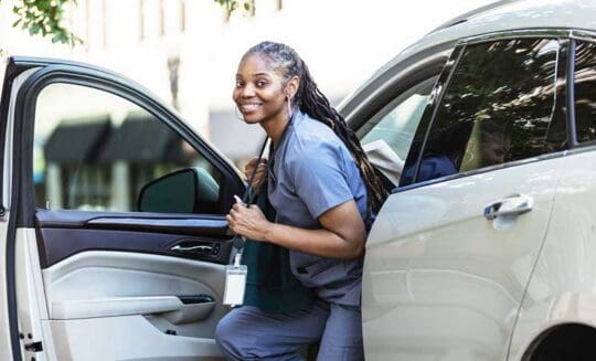 nurse with new car