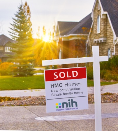 Sold Sign in Front of Home