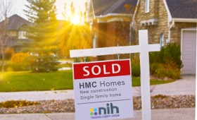 Sold Sign in Front of Home