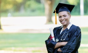 Student graduating after receiving NIHFCU Student Loans