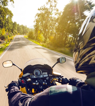 NIHFCU Member riding motorcycle