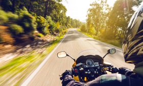 NIHFCU Member riding motorcycle