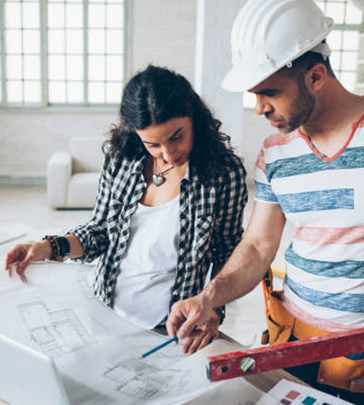 Homeowners working on home repairs furnished by a NIHFCU Home Equity Loan