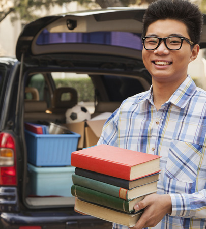 College Student Moving into Dorm