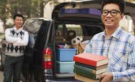 College Student Moving into Dorm