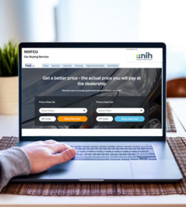 NIHFCU member exploring NIHFCU car loan options on a computer