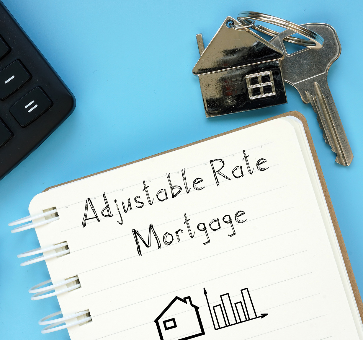 Adjustable Rate Mortgage written on a notepad